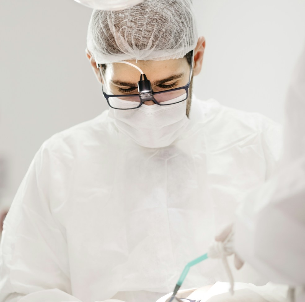 Doctor examining advanced regenerative medical tools with a focus on patient care.