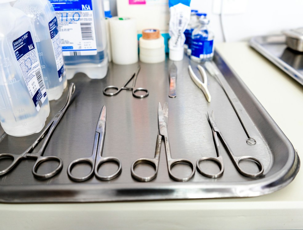 Precision spine surgical instruments neatly arranged on a sterile tray.