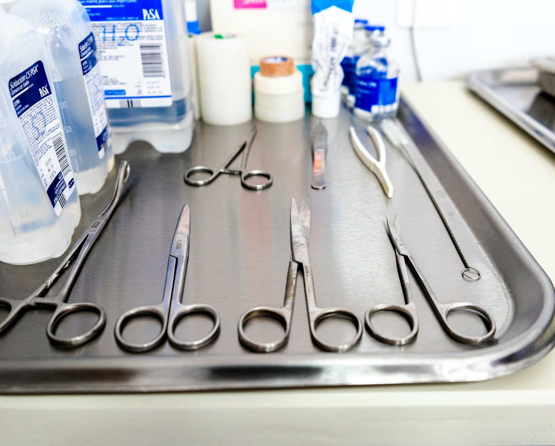 Detailed view of precision spine instruments arranged on a sterile tray.