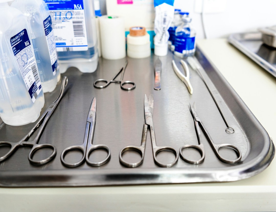 Precision spine surgical instruments neatly arranged on a sterile tray.