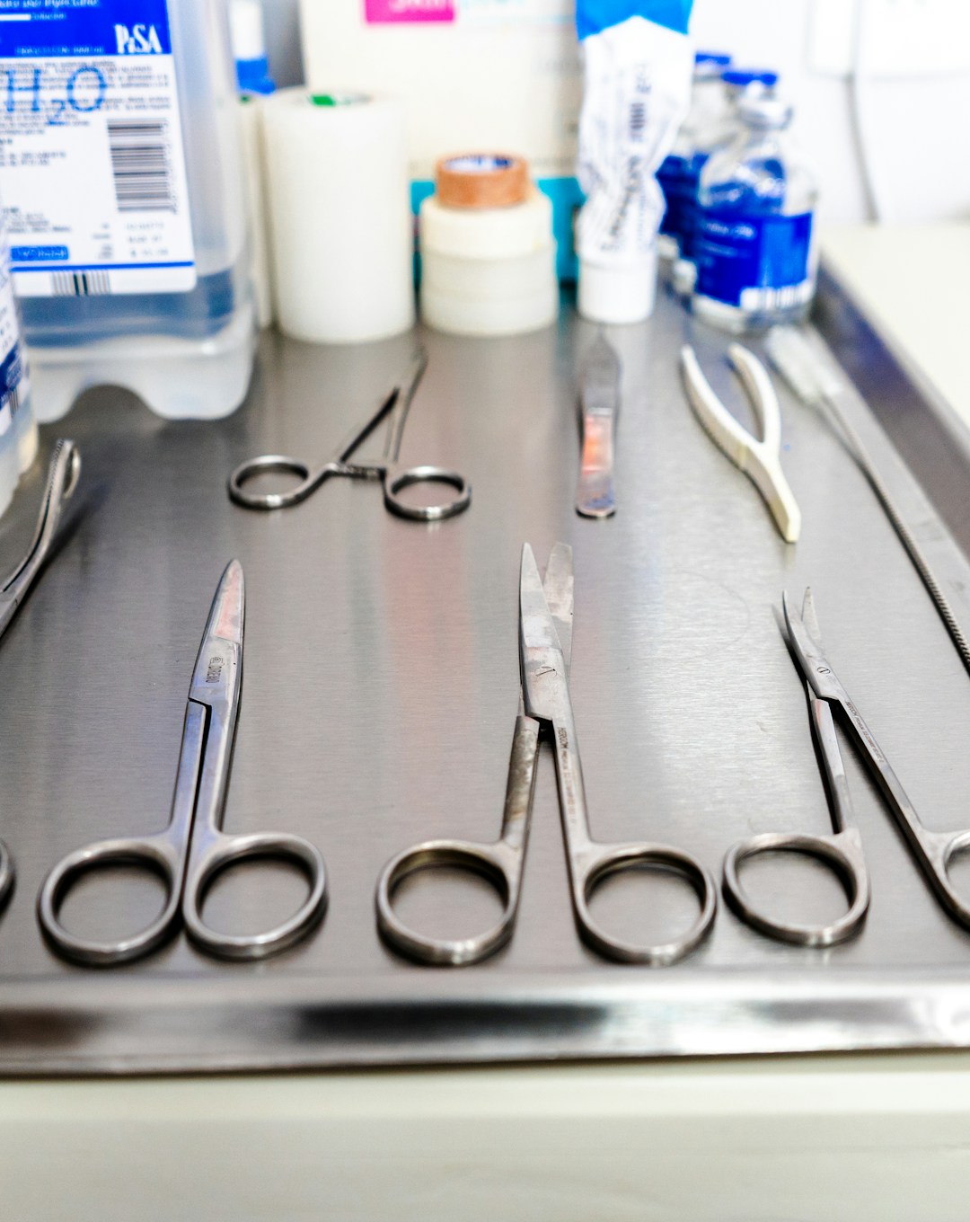 Detailed view of L&K spine instruments arranged neatly on a sterile tray.