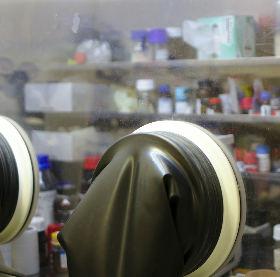 Laboratory environment featuring Cell101 stem cell treatment preparation with scientist in gloves working.